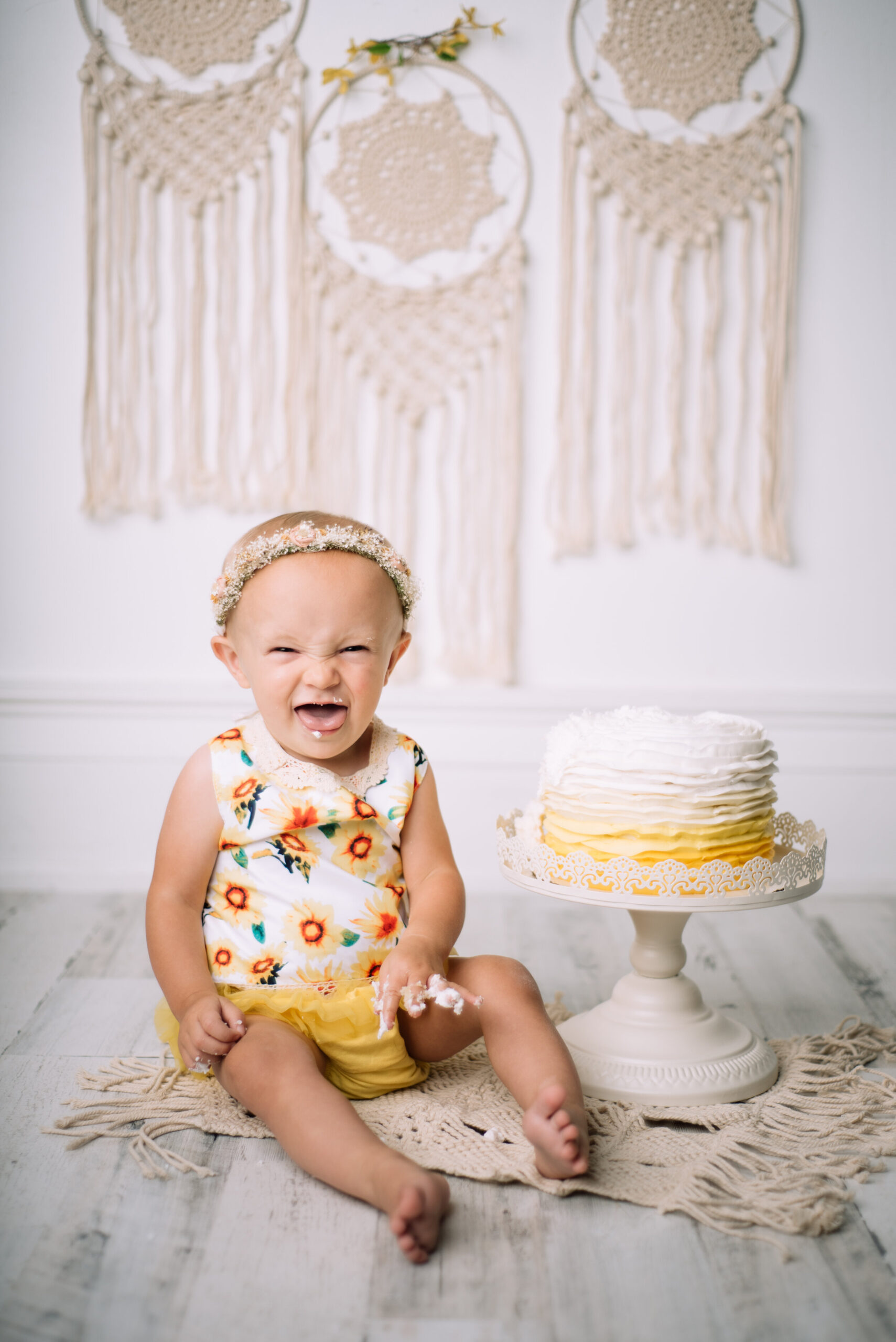 yellow sunflower cake smash 1st birthday girl