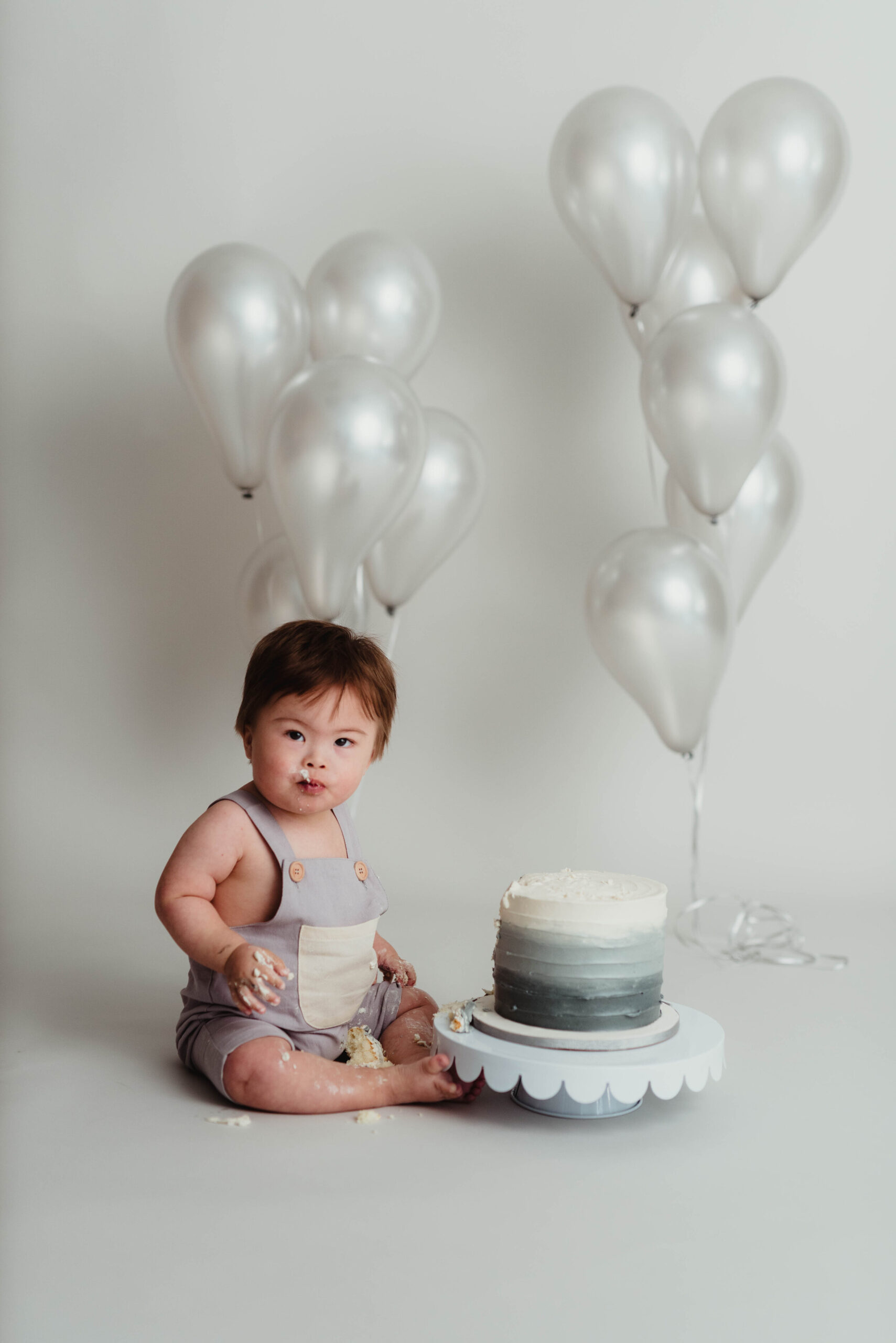 smash cake session for little boy's first birthday