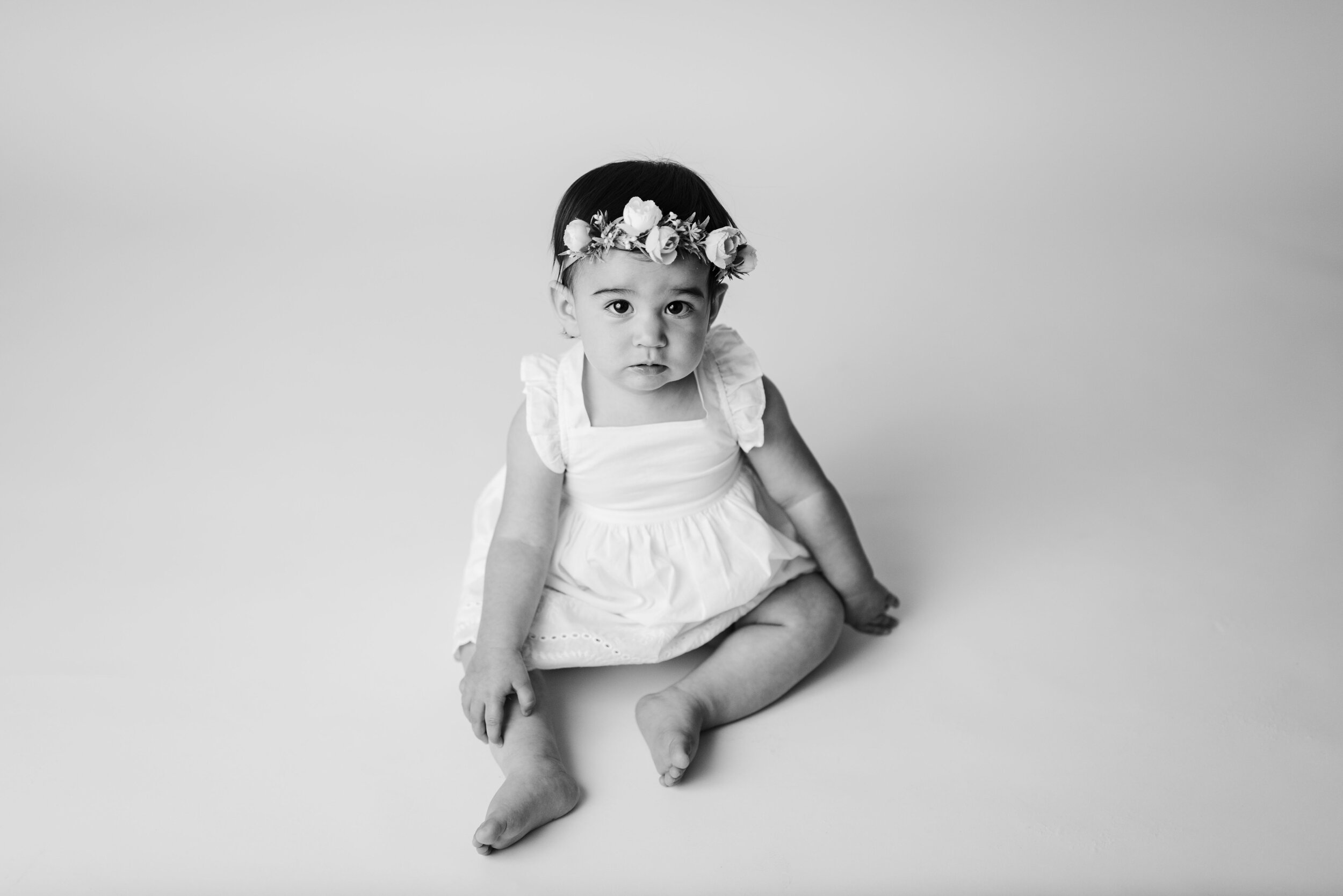 Grow with Me Packages are a great way to capture all of those milestones from birth to first birthday cake smashes in Lafayette Indiana at Kelly’s downtown photography studio.