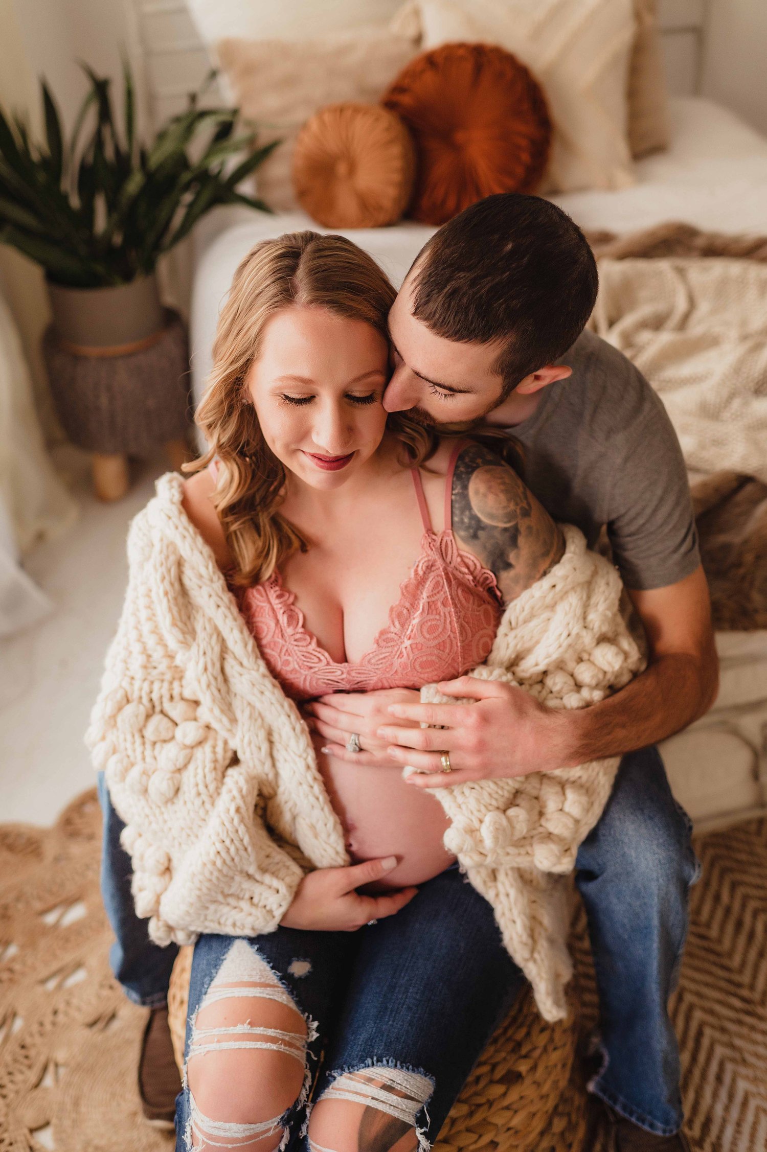 intimate couple's maternity session in studio, cami and jeans maternity photos, baby bump photos with partner in studio