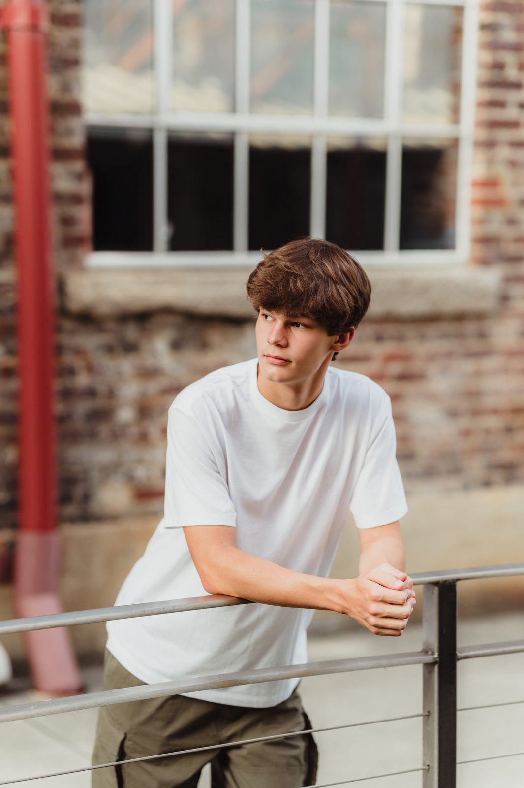 Riley | Greensboro Senior Photos at Revolution Mill - Kelly McPhail Photography